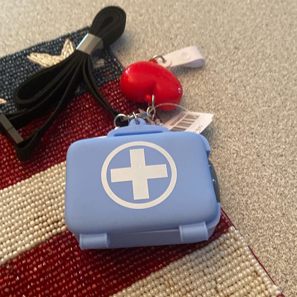 Doctor hand sanitizer holder with santizer